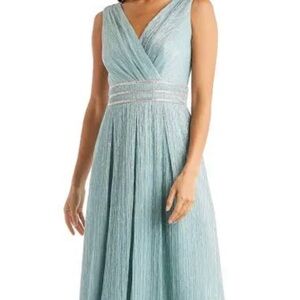 Pleated Metallic V Neck Gown. Color: Seafoam